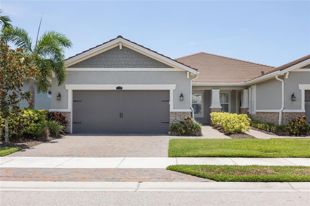 Photo of 8621 Rain Song Road, Sarasota, FL 34238 (MLS # A4701048)