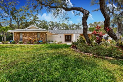 Photo of 2840 Pheasant Run, Clearwater, FL 33759 (MLS # TB8408585) Photo of 2840 Pheasant Run, Clearwater, FL 33759 (MLS # TB8408585)