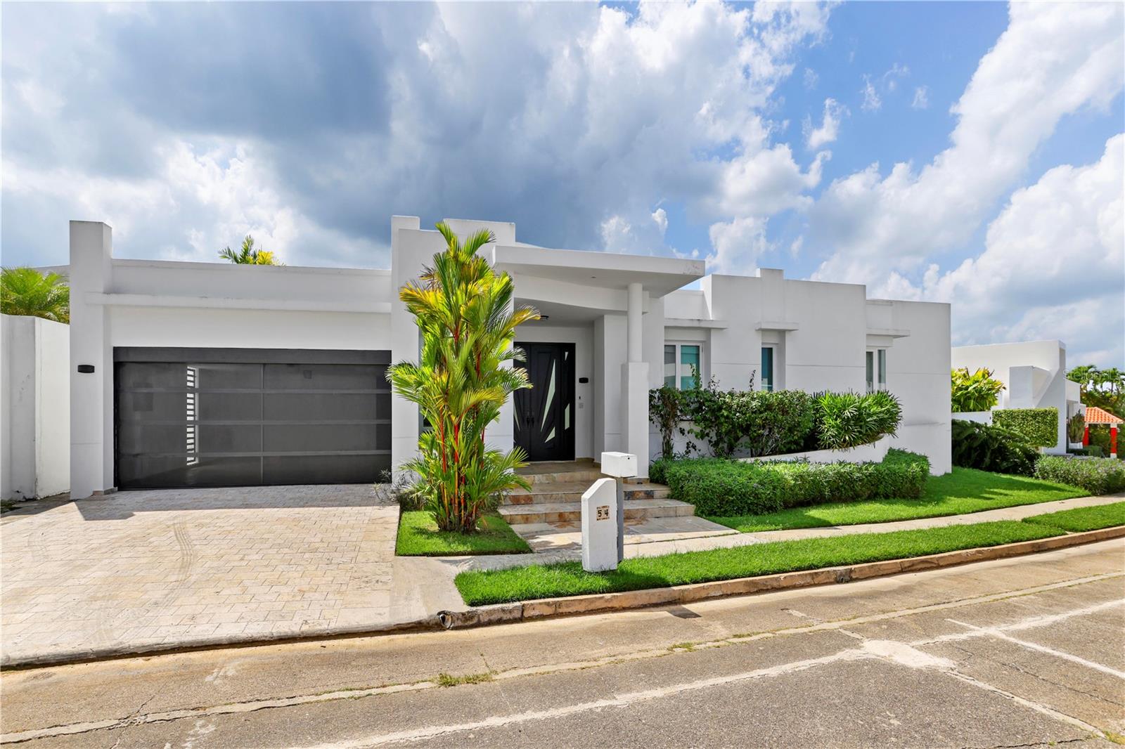 "Excellent single-level property, fully remodeled and ready for your enjoyment. Open concept, natural light, incredible master bedroom
with a fabulous bathroom and walk-in closet. Spacious rooms, marble floors, European kitchen equipped with stainless steel appliances, large laundry room. Spacious terrace with a bar, pool with jacuzzi and heater, green areas, roof access with beautiful views to San Juan.
The community offers double security, patrols, and excellent sports facilities including tenniscourts, swimming pool, gym, basketball courts, trails, a passive park, and much more..."