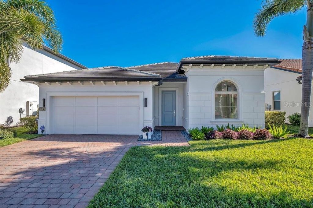 Photo of 10481 Royal Cypress Way, Orlando, FL 32836 (MLS # O6378427)