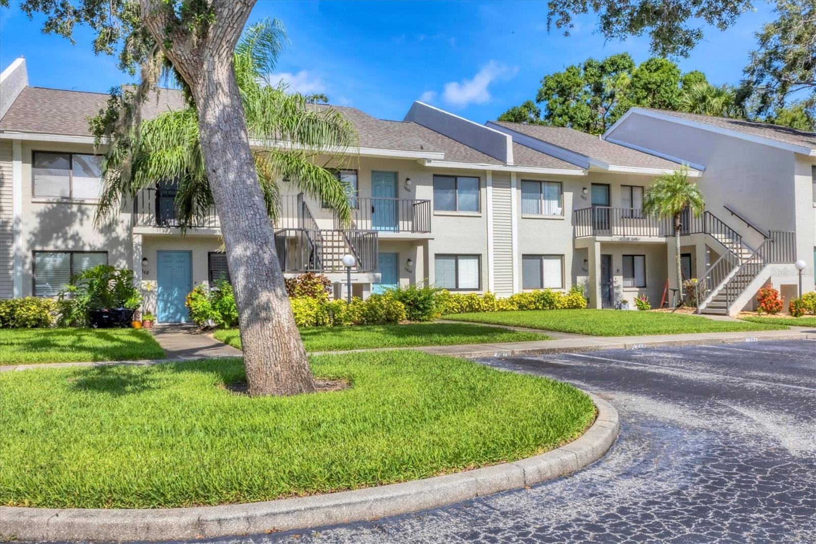 This beautifully maintained condo in the desirable Palm Aire community of Sarasota features a bright, open floor plan with plenty of natural light. The spacious living and dining areas flow seamlessly to a screened lanai overlooking lush landscaping—perfect for entertaining or relaxing. The kitchen offers plenty of counter space and storage, with a cozy breakfast nook. The generously sized master suite includes a walk-in closet and an en-suite bath with dual vanities. Enjoy maintenance-free living with access to community amenities including a pool and clubhouse. Located just minutes from University Town Center, top-rated golf courses, dining, shopping, and the beaches of Siesta Key and Lido Key. This move-in-ready home is ideal for year-round living or seasonal enjoyment!