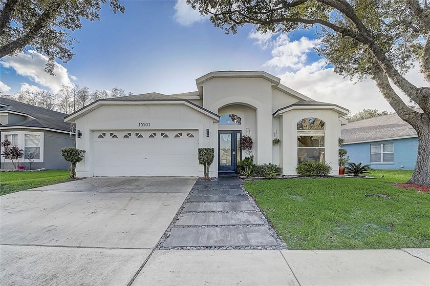 Vaulted ceilings, versatile living spaces, and resort-style community amenities define this 4-bedroom, 2-bath home in the highly desirable Waterford Lakes community offering 1,930 square feet of well-designed living space. Step inside to an open, airy layout highlighted by vaulted ceilings that enhance the natural light and sense of space throughout. A separate family room and living room provide flexibility for both everyday living and entertaining. The family room connects seamlessly to the dining area, creating an easy flow for gatherings, while the kitchen sits at the heart of the home with stainless steel appliances, a center island, pantry, and generous counter space for cooking and hosting. From the main living area, French doors open to a spacious screened lanai, extending your living space outdoors and overlooking a private backyard that offers a peaceful setting for relaxing or entertaining. The primary suite is a true retreat, featuring vaulted ceilings and a private en suite bathroom with dual sinks, a soaking tub, and a separate walk-in shower. Three additional bedrooms provide comfortable space for family, guests, or a home office setup. Located in Waterford Lakes, residents enjoy access to an impressive array of amenities including a community pool, playgrounds, trails, tennis courts, basketball courts, and more. The home is ideally situated with convenient access to shopping, dining, major highways, Downtown Orlando, Orlando International Airport, and world-famous theme parks. Blending comfort, functionality, and an unbeatable location, this home offers an exceptional opportunity to enjoy the best of Florida living in a vibrant community filled with amenities. Mortgage savings may be available for buyers of this listing.