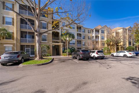 Photo of 3326 Robert Trent Jones Drive #107, Orlando, FL 32835 (MLS # O6373673)