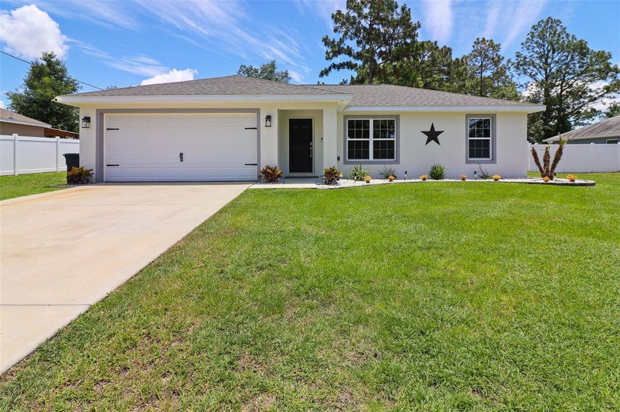 Discover affordable modern living at 12193 SE 87th Terrace in Belleview — now offered for ONLY $250,000 and qualifying for financing! Built in 2020 with durable block & stucco construction, this beautifully upgraded home delivers the perfect combination of style, technology, and value for today’s homebuyer.

Step inside to an inviting open-concept floor plan featuring soaring vaulted ceilings, abundant natural light, and a desirable split-bedroom layout ideal for privacy and comfortable everyday living. The spacious kitchen opens seamlessly to the main living area and includes a large custom pantry designed for maximum storage and organization.

This move-in-ready smart home comes loaded with premium upgrades including a Smart Thermostat, Smart Garage Door Opener, Ring Security System, and AC purifier UV light system for enhanced air quality and energy efficiency. The home has also been newly painted inside and out, giving it a fresh, modern feel throughout.

Enjoy outdoor living in the spacious fully fenced backyard — perfect for pets, entertaining, family gatherings, or future outdoor additions. The extended concrete patio provides additional space to relax and enjoy Florida living year-round.

Additional upgrades include an epoxy-coated garage floor, private wall safe, and a converted garage workshop with expanded laundry room offering incredible flexibility for hobbies, storage, remote work, or creative space.

If you’ve been searching for an affordable newer construction home in Belleview with smart home features, upgraded finishes, and financing availability, this exceptional property is a must-see. At only $250,000, opportunities like this don’t last long!