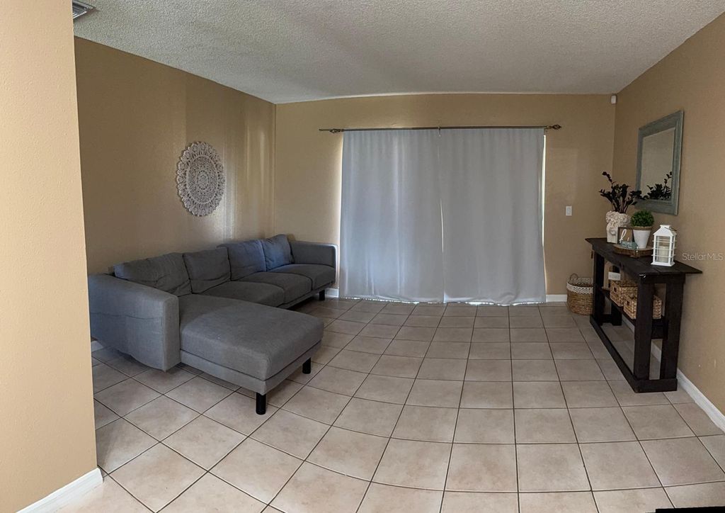 Photo of 5871 North Lane, Orlando, FL 32808 (MLS # O6395796)
