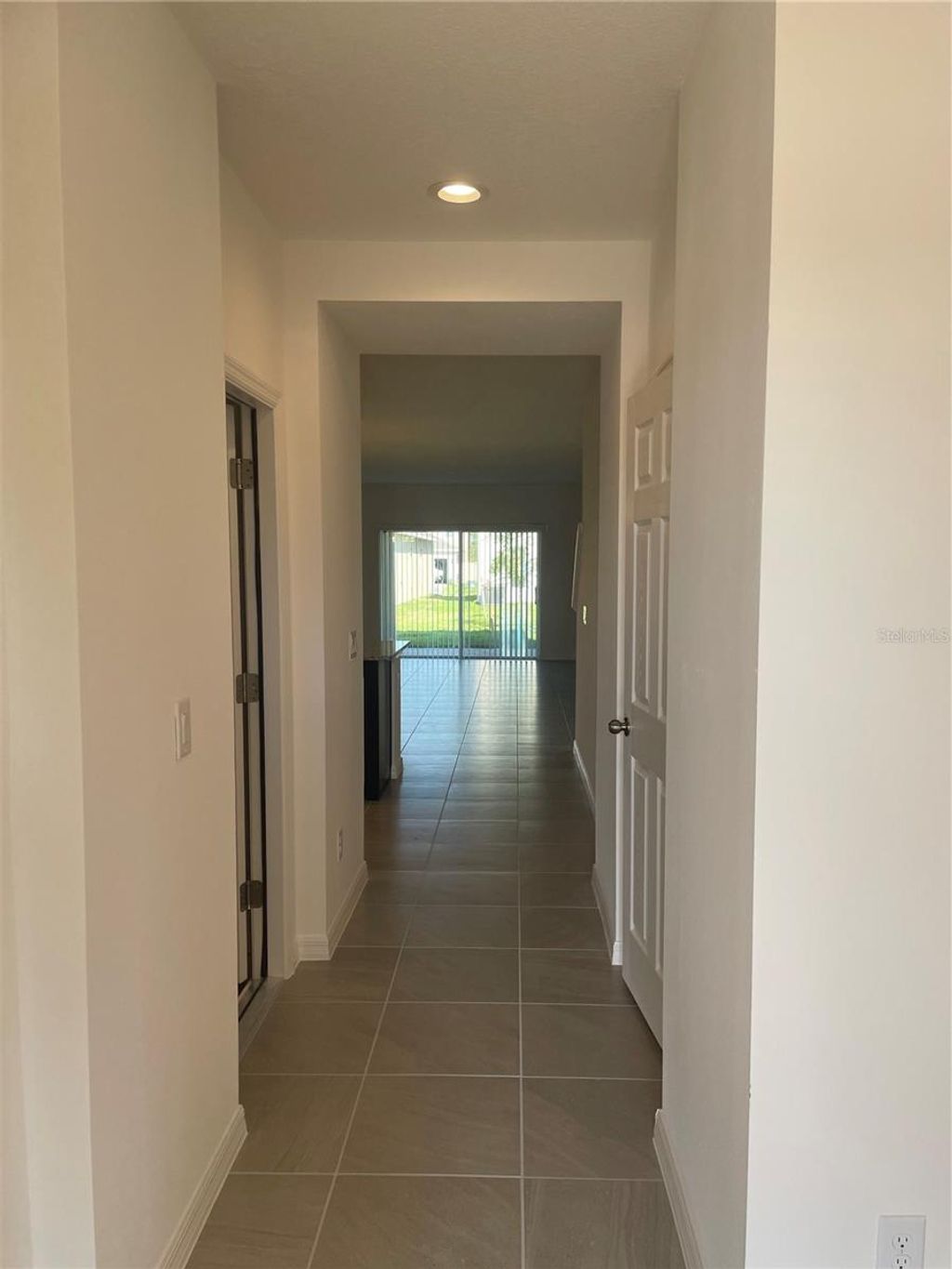 Photo of 1120 Myrtle Hammock Lane, Davenport, FL 33837 (MLS # O6398022)