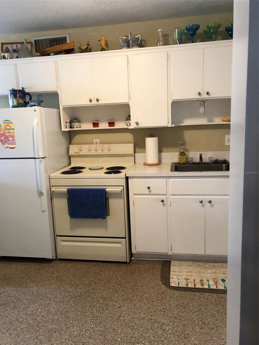 Central Beach Walk to Flagler 3rd Ave, Fantastic Location 400 steps to the public 1st Ave Oceanfront  walkway to beach , extra parking on this long driveway for boats RV multiple cars trailers,  leads to a quaint metal roof beach bungalow, with  open living room to kitchen, dining alcove,  Florida room could be 3rd bedroom has closet, 2 bedrooms,  2 full baths, washer dryer, garage, work area , room for pool or build up and enjoy Ocean views ;Water: City