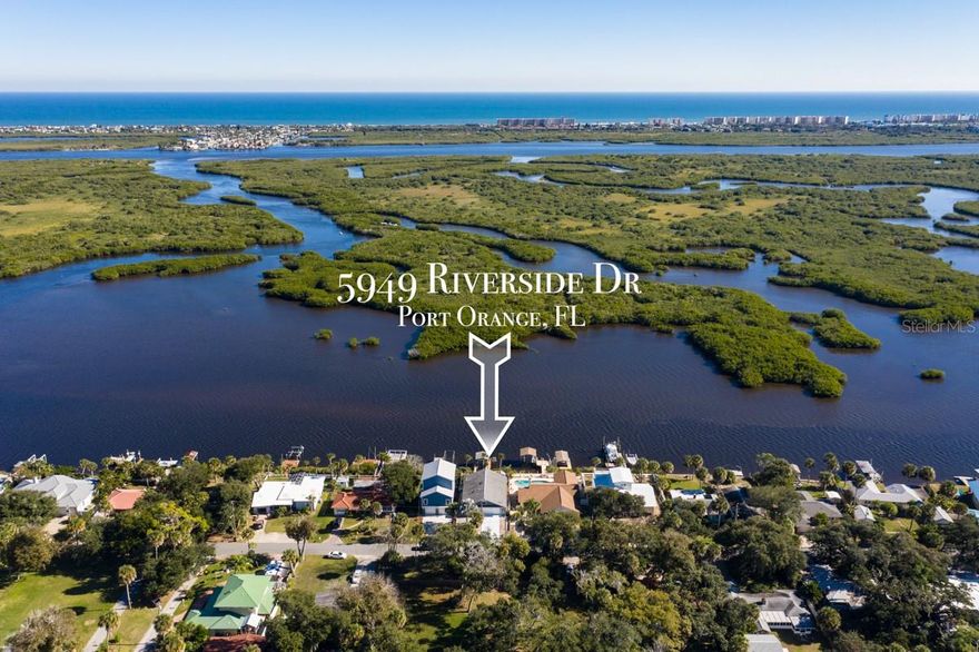 Paradise on the water awaits.
This wonderful RIVERFRONT home is looking for a new family to love it!
This WATERFRONT home is a boat lover's dream with a private dock, deep water and boat lift.
Located in a quiet neighborhood with no HOA.
Some features of this 2 bedroom, 2 bath home include: a large living room with scenic views of the water, a wood burning fireplace, open kitchen, a flex space above the garage which can be used an extra guest room or office, hurricane shutters, an enclosed patio with jacuzzi & 2 murphy beds in the second bedroom.
There is a large driveway for your boat trailer in addition to your two car garage.
The outside of the home has a large deck and side deck to bbq and entertain as you take in the sights of dolphins, manatees and boats going by and a lower deck for magnificent views. This home is great for entertaining outside!
Conveniently located near shops, restaurants and our local famous beaches.
There has never been a better time to own a property in Sunny Florida.
Bring your boat, what else do you need:-)
Being Sold furnished.  Call today! ;Water: City