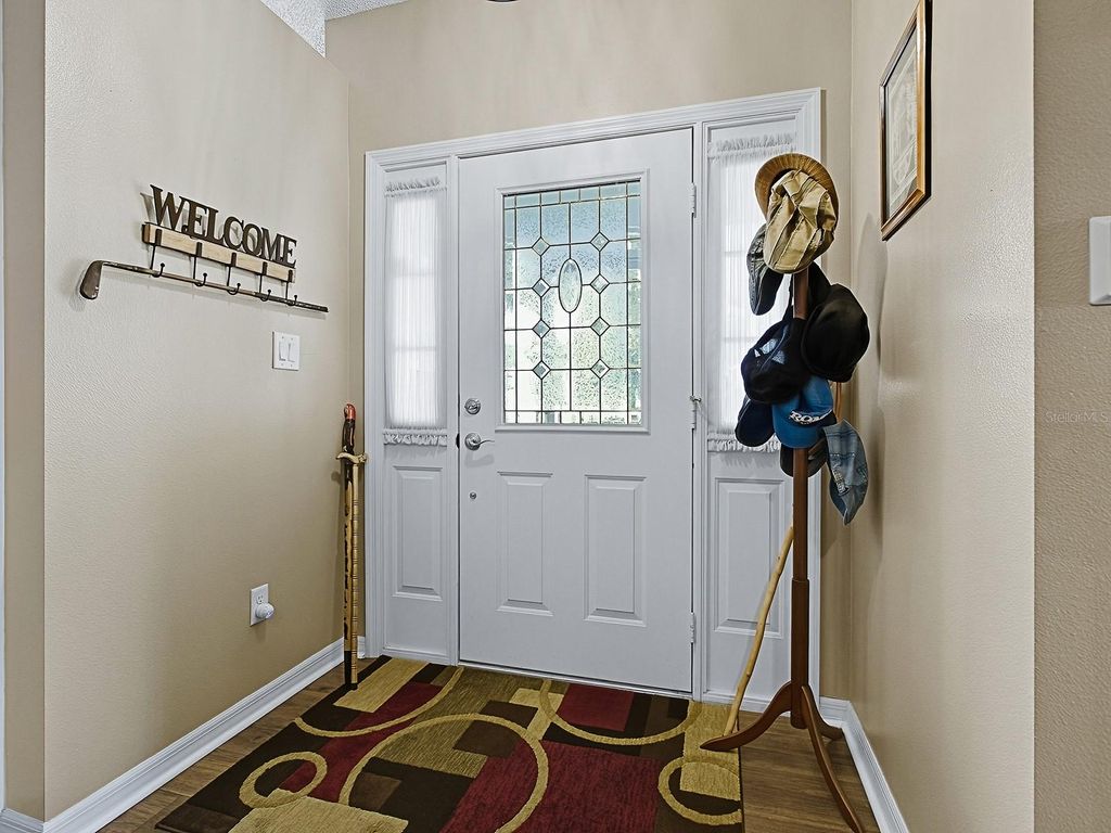 Photo of 4949 Sawgrass Lake Circle, Leesburg, FL 34748 (MLS # G5102655)