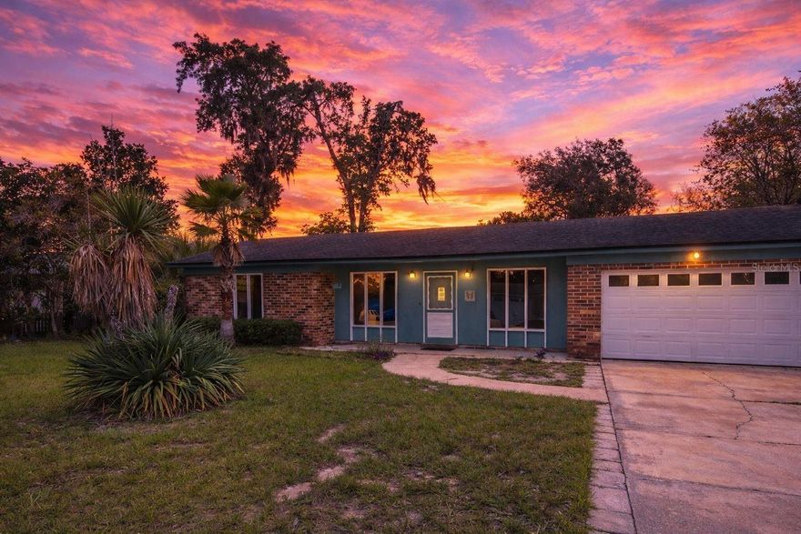 Live in the City - Enjoy the River! This move-in ready 3/2 home with an in-ground pool, is in an established Orange Park neighborhood close to everything you need! Minutes from schools, restaurants, and beautiful Doctor's Lake. Only 15 minutes from the Lakeshore Boat Ramp and Whitey's Fish Camp, and just 4 miles from the Thrasher-Horne Center. Conveniently situated between local hospitals, this home offers both comfort and convenience. Inside, you'll find new flooring, kitchen cabinets, countertops, and sliding glass doors that open to a spacious 280 sq. ft. screened porch overlooking the 16'x30' in-ground pool—perfect for relaxing or entertaining. The large living room is big enough to create both a living and sitting area and features a cozy fireplace. The primary suite includes an ensuite bath and two closets, while the second and third bedrooms share a full bath and has generous closet space. The home is vacant and waiting for your personal touches to make it your own.