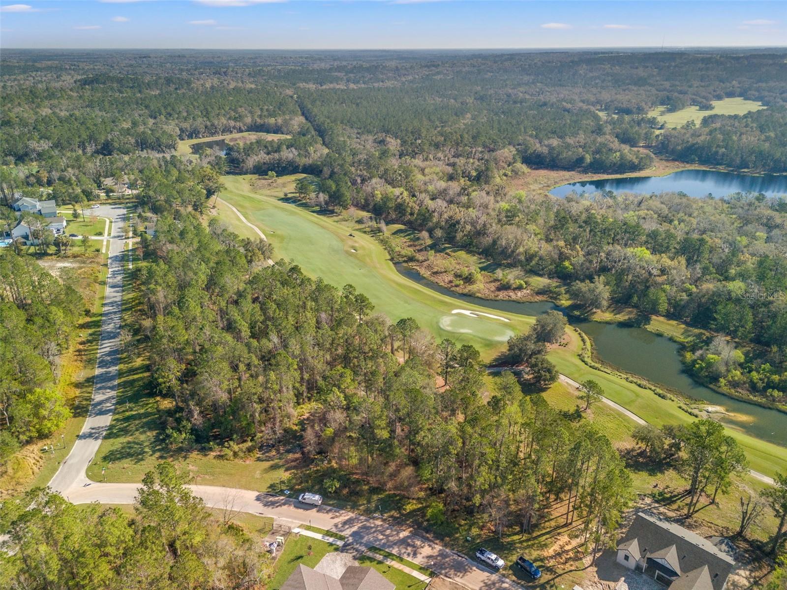 Incredible opportunity to own a lot in Southern Hills on the 11th HOLE! Not only does this lot have amazing direct golf course views, but it also has a pond behind it and a conservation across the course! Sitting just under a half acre, this lot is ready for its new owner. Come build your dream home and pick your builder! The distinguished community of Southern Hills consists of one of the top Golf Courses in Florida designed by Pete Dye with over 250 feet of elevation, a resort style pool, Har-Tru tennis courts, a brand new poolside bar and cafe, a high end clubhouse that includes a restaurant, bar, event space, and PGA Pro Shop, and so much more!