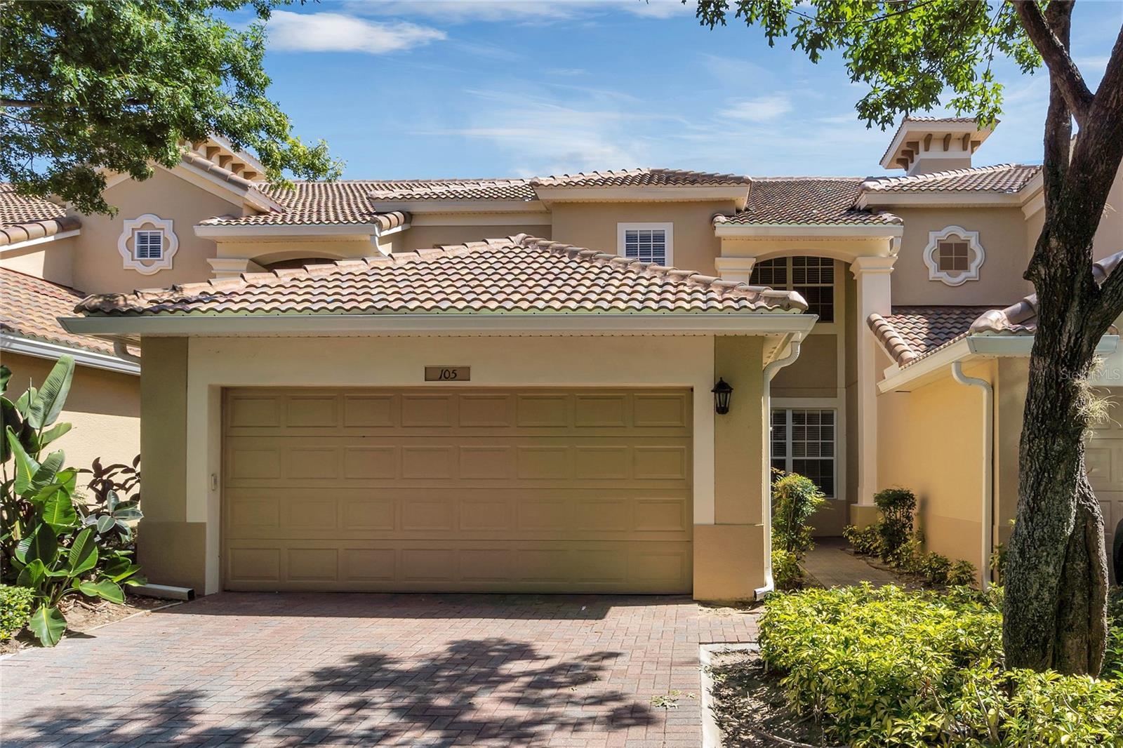 WELCOME HOME! You’ll enjoy resort-style living in this upscale and securely-gated community featuring a fitness center, tennis and basketball courts, and a sparkling pool and spa overlooking a picturesque pond and fountain. This spacious 3 Bedroom, 2.5 Bath unit has an open floor plan and 2 car garage. The kitchen features Stainless appliances, an island with a raised bar overlooking the great room and the family dining area, as well as a formal dining area. The great room opens onto a spacious screened privet lanai. Upstairs are the three bedrooms and two baths. The master bath has a soaking tub and separate walk-in shower, an extra-wide vanity with dual sinks, a water closet and a huge, walk-in closet. The secondary bedrooms both have generous closet space and share a bath and a large linen closet. Call for your private showing today! NOTE: this is a smoke-free residence.