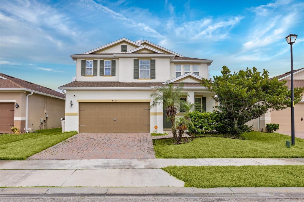 Photo of 4869 Grassendale Terrace, Sanford, FL 32771 (MLS # O6442326)