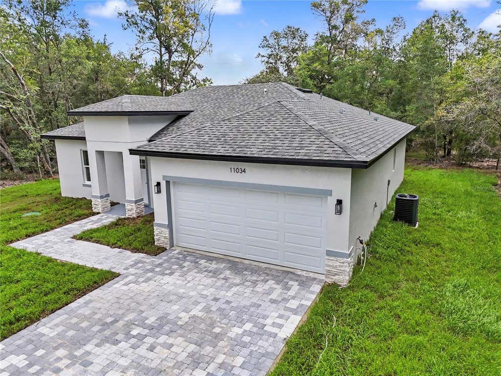 Photo of 11034 N Academy Drive, Citrus Springs, FL 34434 (MLS # TB8525536)
