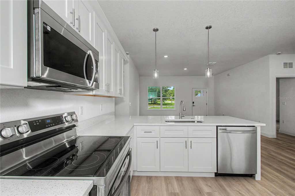 Photo of 11034 N Academy Drive, Citrus Springs, FL 34434 (MLS # TB8525536)