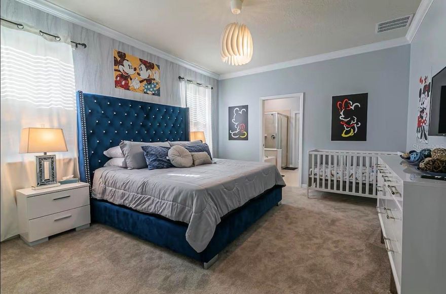 This Ten-bedroom, Eight-bathroom open-floor concept home offers all your family, friends, and possibly guests' need! The kitchen-living-dining is perfect for gatherings, and the views of the beautiful pool backyard are amazing. The backyard offers a large deck, and the pool includes an inground jacuzzi. The kitchen features all stainless steel appliances, dark color cabinets, and granite countertops with eating space. Also, on the main level, you'll find the laundry room, half bath, and garage, which was turned into the perfect game room. As you walk upstairs, you are greeted by this massive, beautifully decorated loft. All the themed rooms were carefully decorated to make your guest and family feel like they are on a Florida Vacation. The HOA amenities include a waterpark-style community resort pool with dueling slides- lazy river- hot tub/spa- splash pad-pool side miniature golf course- outdoor bar and dining- fire pit area- clubhouse- fitness center- arcade/ gaming room- playground- basketball courts- soccer fields & more! Close to Disney & other Theme Parks, Local Attractions, Shopping, Restaurants, Orlando International Airport & Major Highways taking you to the Beaches... Location is KEY!