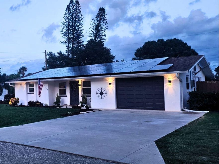 Welcome to this charming oasis in the heart of Venice, FL! This stunning two-bedroom, two-bathroom home is nestled on a spacious .28-acre (12,000sqft) desirable corner lot, offering ample space and privacy. Upon entering, you will be greeted with the bright, spacious living room leading to the dining area. A lovely primary bedroom awaits with a beautifully renovated en-suite bathroom. The second bedroom at the front of the home makes for a great guest room. As you enter the dining room, you'll feel the kitchen's warmth, which is the heart of the home. The Indoor laundry room, separate from the main garage, features a pantry for storage. There is also a second bathroom with a shower. The Florida room is full of natural lighting, overlooking the gorgeous swimming pool and spa. This room can be used as a den or a fun games room, Step outside to enjoy your private paradise, great for relaxing, and entertaining guests with the outdoor kitchen patio. This home is located in a No Flood Zone Area with a Higher Elevation of 27ft Above Sea Level, very desirable for anyone looking to move to Venice FL. You can also say goodbye to high utility bills with the 34 solar panels (Fully Paid Off) installed on the roof. There is RV parking or room to store a boat by the side of the garage. For an optional fee, This home has access to a private beach ferry and boat ramp through the South Venice Civic Association. The ferry takes passengers to a secluded area of Venice Beach that's not accessible by land vehicle. With its prime location in Venice, you are just minutes away from the Historical Downtown Shopping and Dining, the World-Famous Venice Beach, Shamrock Park where the Legacy Trail starts, and more, this home truly has it all. Don't miss out on this rare opportunity to own your dream home in paradise!