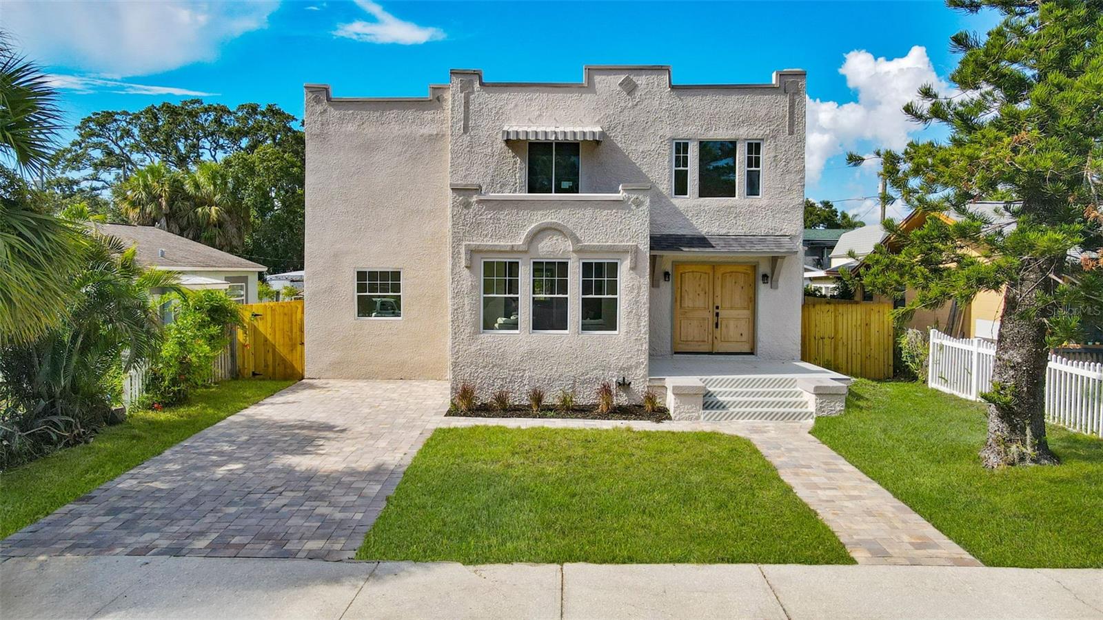 This is the HOME you’ve been dreaming of…A fully renovated 1925 Spanish-style two-story home masterfully blends the charm of its original architecture with the conveniences and aesthetics of modern living.. Fully renovated with NEW roof, NEW ac, NEW water heater, NEW fence, NEW electric panel, NEW paver driveway and totally new cosmetic design.
You will enjoy this one-of-a-kind property on a spacious lot with lots of room for entertaining and room to build your dream pool. Close to St Petersburg Golf and Country Club, Downtown St Petersburg, and Gulf Beaches.