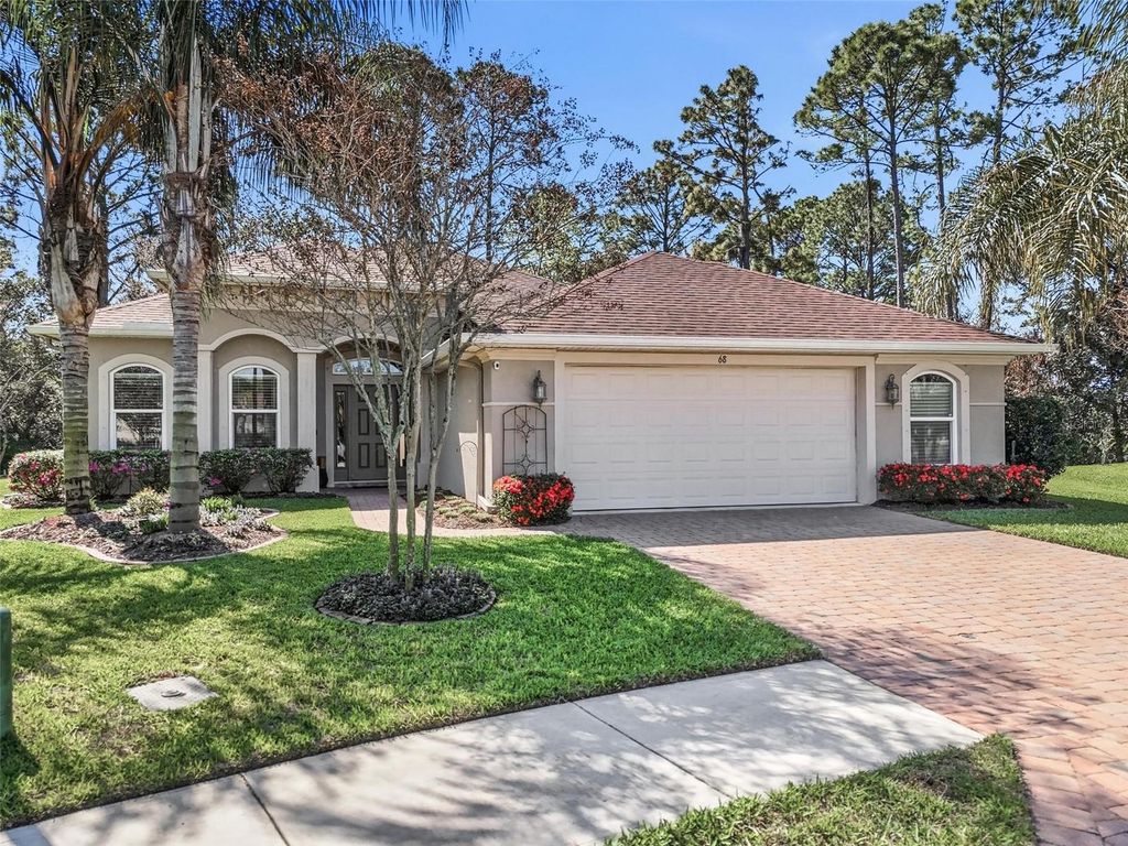 Photo of 68 Graham Woods Place, Palm Coast, FL 32137 (MLS # FC316853)