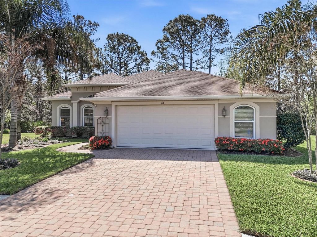 Photo of 68 Graham Woods Place, Palm Coast, FL 32137 (MLS # FC316853)
