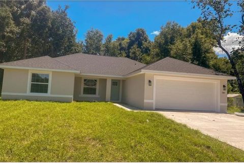 Photo of 12382 SW 99th Lane, Dunnellon, FL 34432 (MLS # W7883055)