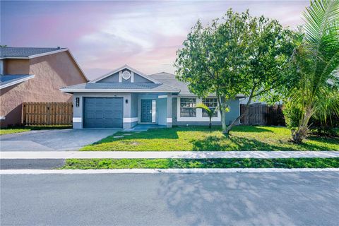 Photo of 3102 NW 123rd Terrace, Sunrise, FL 33323 (MLS # TB8482511)