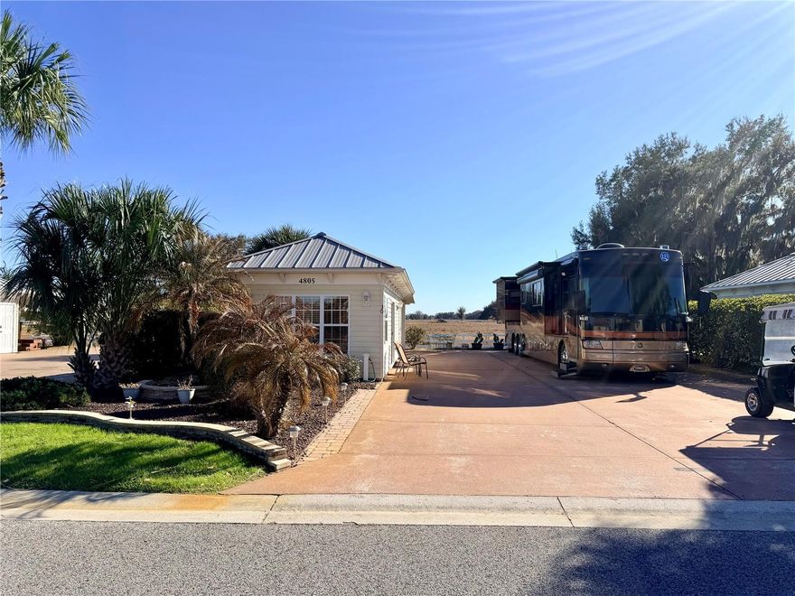 Welcome to Lot 30 at Florida Grande Motor Coach Resort—a 5076 sq ft north-facing back
in on a quiet street, designed for easy Florida living with a view you’ll never get tired of. 
Your coach is perfectly accommodated on a 26’x76’ reinforced concrete pad with full 
hookups, plus extra pavers along the pedestal side for added outdoor function. Out front, 
tasteful landscaping creates great curb appeal, while boundary hedges help define the space 
and add a sense of privacy. 
The 384 sq ft Grande Suite makes this property truly turnkey for hosting guests (because once 
you own in Florida… they will come!). Inside you’ll find a comfortable living area, a 
kitchenette with ample cabinet space, and a full bath with a tub/shower combo. In the back 
laundry/storage area, you’ll appreciate the washer/dryer, additional refrigerator, and a water 
softener. 
And then there’s the star of the show: the covered 12’x16’ patio overlooking a peaceful pasture 
with cows, a horse, and beautiful live oaks. It’s the kind of serene, “exhale” view that instantly 
slows life down—morning coffee, evening happy hour, and everything in between. 
Florida Grande Motor Coach Resort is a deeded Class A & Super C community in Central 
Florida, offering a quiet country setting that’s still close enough for easy day trips to Tampa, 
Orlando, and Florida’s top attractions. Owners love the active lifestyle with regularly 
scheduled events, gatherings, and community activities—including a growing pickleball scene 
with brand-new courts—all wrapped in the warm, welcoming spirit that’s made Florida Grande 
known as Florida’s friendliest motorcoach resort. 
HOA dues are $995/quarter and include water, sewer, trash, irrigation, mowing,resort 
amenities and common area maintenance.  Electricity is metered individually and paid directly to 
the electric company. 
If you’re looking for a property where you can truly stretch out, feel at home, and enjoy the 
best of Central Florida—Lot 30 delivers the space, the suite, and that unforgettable backyard 
view. Explore the life. Own the dream.