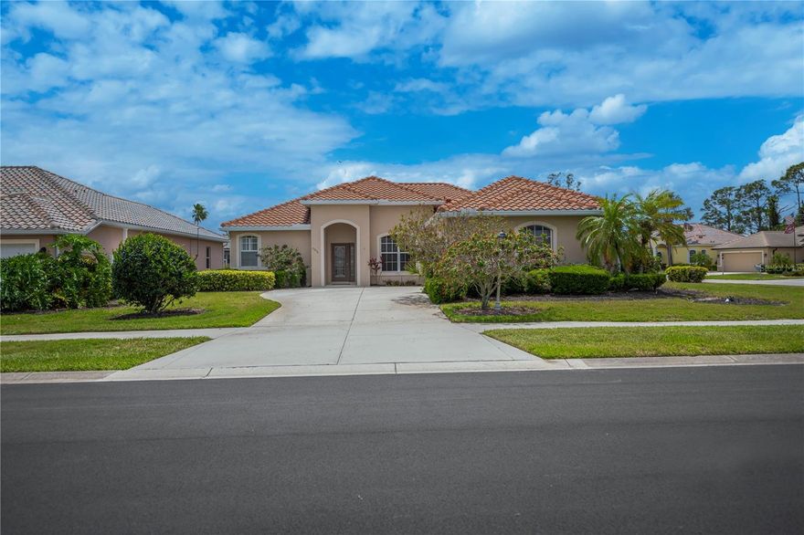 EXCEPTIONAL, move-in ready beauty built in 2005, perfectly situated on a spacious corner lot within the GATED, golf-centric community of Bobcat Trail! This nearly 1,900 sq ft home offers 2 bedrooms, 2 bathrooms, and a 2-car garage—plus a versatile bonus den/office that can easily serve as a third bedroom. STUNNINGLY turnkey furnished, this exquisite residence stands out with upgrades and its remarkably UNIQUE /OPEN floor plan.

As you approach, you're welcomed by soaring entryway, manicured mature landscaping, stylish leaded glass front door, awesome side yard adding the feel of an exceptional grand entrance.SHOWCASING LIKE A MODEL HOME, this STUNNER features a formal foyer, elegant tray ceilings throughout with faux inserts, decorator crown molding, rounded corners, and a pocket slider opening onto a  spacious screened and covered rear patio with ROOM FOR A POOL.

Inside, enjoy a formal dining room with decorator lighting complemented by a charming aquarium window in the dinette area, soaring ceilings, split bedroom layout, and French doors enclosing the bonus office/den. The main living spaces are tiled for easy care, and a spacious laundry room with storage adds convenience. The spectacular 2023 tile roof completes the picture of quality inside and out.

The chef’s kitchen is a highlight, boasting crown molding topped cabinetry, a large walk-in pantry with modern etched glass door, Corian countertops, plantation shutters, and recessed lighting. A cozy breakfast bar and the upgraded fingerprint-resistant appliances enhance functionality and add even more style.

Retreat to the luxurious master suite, designed with a formal 9x9 dressing room featuring ample storage plus an additional walk-in closet—ideal for him and her. The en-suite bath is spa-inspired with dual sinks, beautifully decorated includes  a large Roman-style shower, and a private commode.

Both the living room and foyer impress with beautiful tray ceilings, while the formal dining room exudes elegance with its crown molding and complimentary accents with abundant natural light with access to the lanai. This home is not in a flood zone and has low monthly HOA fees.

Bobcat Trail offers a deed-restricted, gated lifestyle with fantastic amenities including a heated community pool, exercise room, pickleball courts, and a vibrant community center perfect for social events. Conveniently located between US 41 and I-75, you’re just minutes from Fishermen’s Village, Ponce De Leon Park, the Spring Training facilities for the Rays and Braves, as well as premier shopping, dining, boutiques, and live entertainment.

Enjoy a short drive to the stunning Gulf beaches of Boca Grande, Englewood, and Manasota Key, where world-class fishing and pristine white sands await.

Schedule your private tour of this immaculate Bobcat Trail home today and discover the perfect blend of comfort, convenience, and community. Your dream home is ready for you!