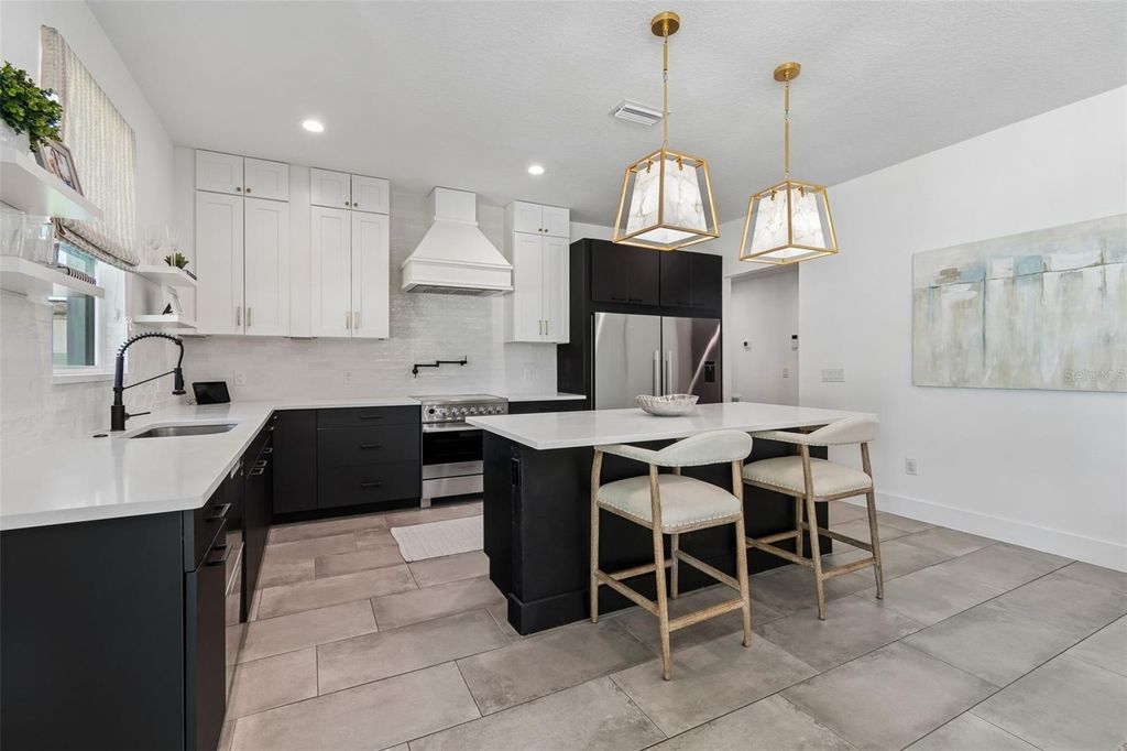 Photo of 3209 W Rogers Avenue, Tampa, FL 33611 (MLS # TB8491911)