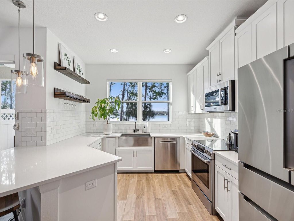 Photo of 11404 Crowned Sparrow Lane, Tampa, FL 33626 (MLS # TB8314789)