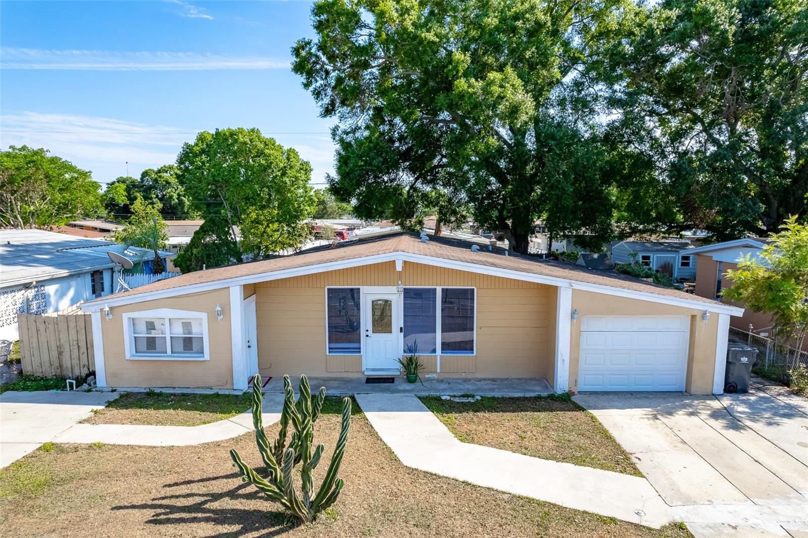Well maintained and move-in ready 3 bedrooms, 2 bathrooms, and 1 car garage home. Property includes a 1 bedroom and 1 bathroom mother-in-law suite. This home features a large living room with kitchen and dining room combo. There is tile flooring throughout. New HVAC system installed in 2022 and the roof in 2010. The property is conveniently located within a 10-minute drive to the Tampa International Airport, 15 minutes to Downtown Tampa, and in close proximity to International Plaza, Westshore Mall, Citrus Park, Midtown Tampa, Tampa Yankees Baseball complex, Raymond James stadium and amazing dining options. Schedule your private showing today!