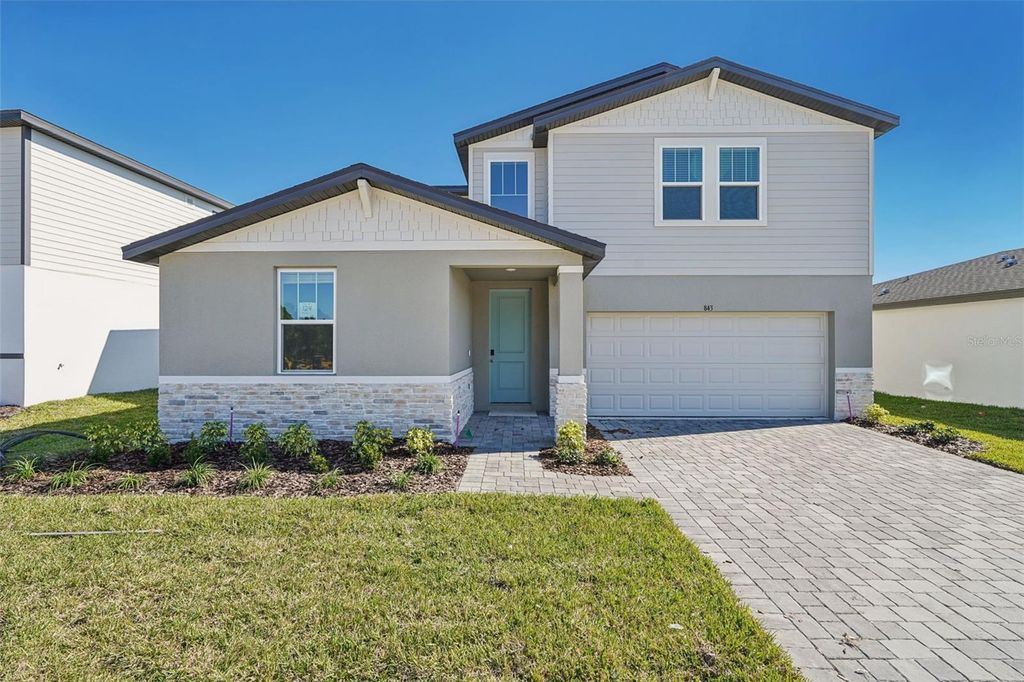 Photo of 843 Sunshower Drives, Haines City, FL 33844 (MLS # O6348095)