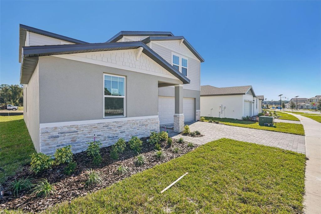 Photo of 843 Sunshower Drives, Haines City, FL 33844 (MLS # O6348095)