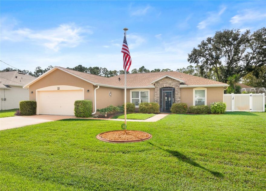 Discover this beautifully maintained home in the desirable Pine Grove neighborhood of Palm Coast, showcasing exceptional upgrades and energy efficiency with 24 owned solar panels and a 2021 roof. Spanning close to 2,000 sq ft, the residence offers elegant tile and laminate flooring throughout, marble windowsills, and 120 mph Low-E hurricane glass windows for peace of mind. The updated kitchen features soft-close cabinets with pull-outs, granite countertops, a farm sink, under-cabinet lighting, skylights for added natural light, and brand-new stainless appliances (2025). The guest bathroom also enjoys the benefit of a skylight, creating a bright and welcoming space. Ceiling fans are thoughtfully placed throughout the home to enhance comfort, and convenient pocket doors lead to the inviting Florida room, perfect for relaxing or entertaining. Enjoy Florida living at its finest with a heated salt-water pool, screened and tiled double lanais, and a cozy firepit, plus a beautiful Florida room overlooking the peaceful pool setting. Additional highlights include a Culligan whole-house water filtration system (owned), deep-well irrigation, a two-toned vinyl fenced yard, generator transfer hookup, and tasteful stone accents with landscape curbing. With the owned solar panels, the average electric bill is just $113 per month, offering significant long-term savings. This home combines style, comfort, and efficiency in one exceptional package.