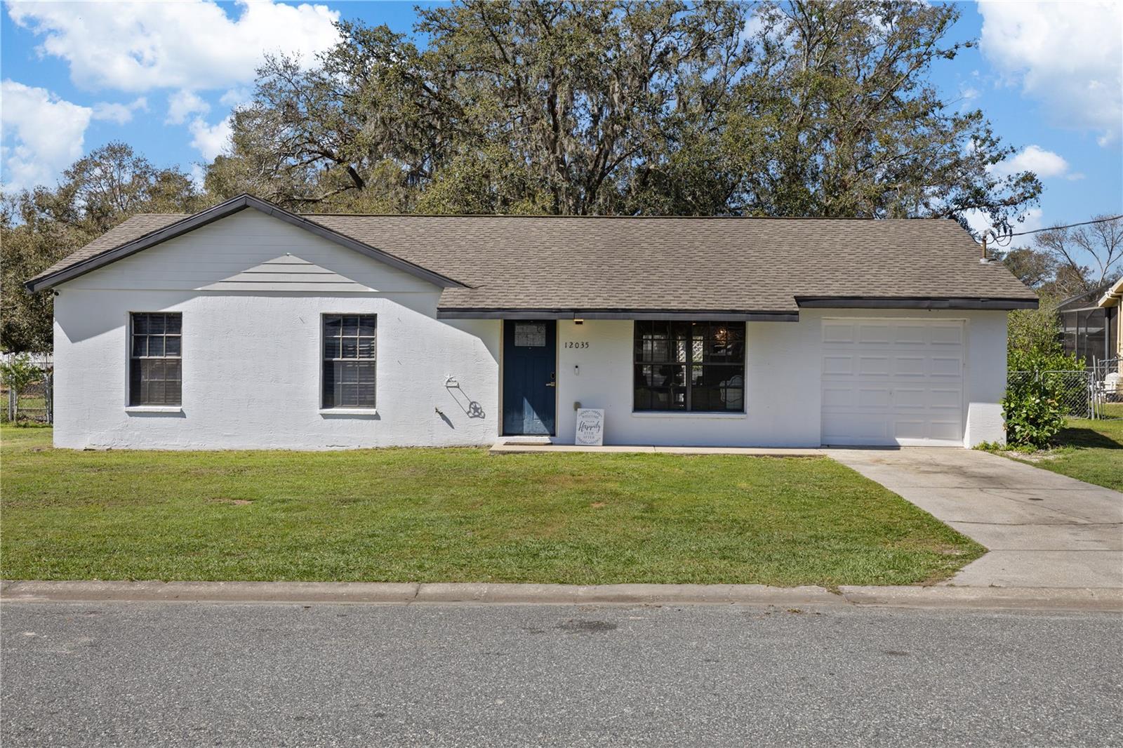 WHERE HISTORY MEETS MODERN COMFORT – A HIDDEN GEM IN SAN ANTONIO: Tucked away in the charming, history-rich town of San Antonio, Florida, this beautifully renovated 3-bedroom, 2-bathroom home offers the perfect balance of small-town charm and modern convenience. The house offers 3 bedrooms and 2 bathrooms with an open floorplan that feels spacious and bright. Fully updated in 2021, this home blends timeless appeal with fresh upgrades designed to bring style, comfort, and functionality. But here’s what truly sets this home apart: the insulated, cooled garage. With a mini-split AC system installed just last year, this space isn’t just for parking—it’s a versatile retreat, ready to be your workshop, home gym, or creative studio. Enjoy the perks of NO CDD fees while still being conveniently located just 30 minutes from Tampa, 15 minutes from Wesley Chapel, & St. Leo University is less than 3 miles away. A quick drive to I-75 & US 301. For those who love local charm, you’re minutes from quaint shops, local dining, and everyday conveniences. Even daily errands are a breeze with a brand-new Publix just 5 minutes away. Homes like this—where history meets thoughtful, modern living—don’t come around often. Experience the best of San Antonio, FL, in a home designed for the way you live today.