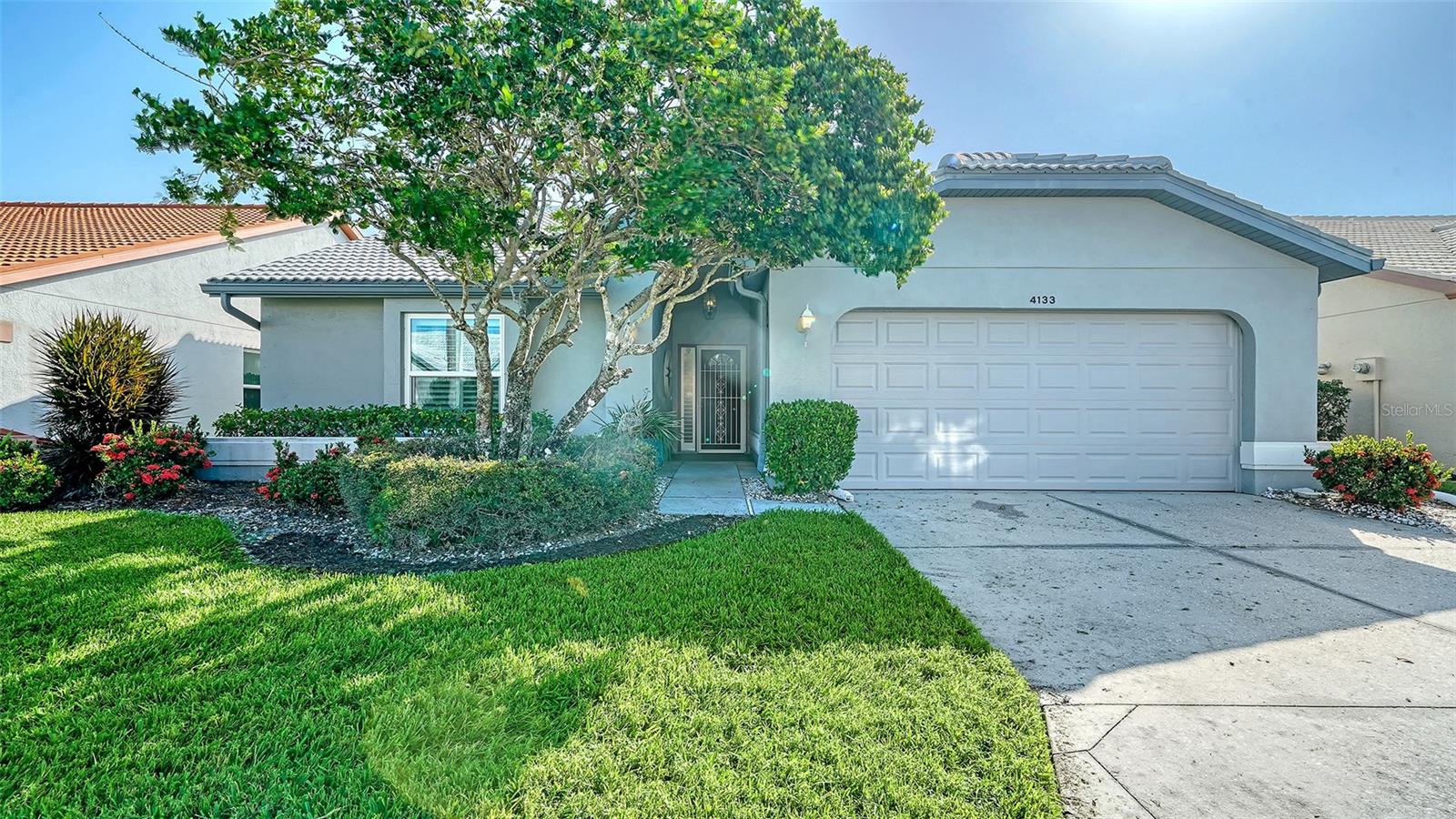 Discover this exceptional 3-bedroom, 2-bathroom stand-alone villa nestled in the highly sought-after Casa Del Sol community. Enjoy the single family home lifestyle with all of the conveniences of a condominium. With a brand-new HVAC system installed in 2024, this home combines modern comfort with elegant design. New hurricane windows installed in 2022. The thoughtfully crafted split floor plan ensures privacy for guests, while soaring ceilings up to 15 feet create an expansive and inviting atmosphere. The spacious kitchen features high ceilings and stunning stone countertops, perfect for culinary enthusiasts. The master bedroom is a true retreat, complete with two walk-in closets and a recently updated bathroom boasting double sinks and a luxurious walk-in shower. Plantation shutters throughout are the perfect compliment to enhance the abundant natural light. The home's layout is both functional and aesthetically pleasing, complemented by an enclosed patio and a convenient 2-car garage. Residents enjoy access to a vibrant community clubhouse equipped with a kitchen, pool table, fitness center, and entertaining area, alongside a large swimming pool and tennis courts. Ideally located across the street and next to shopping and dining, this villa is also just a short drive from the beautiful Siesta Key Beaches, top rated medical facilities, and SRQ International Airport. Don’t miss the opportunity to make this delightful villa your new home!