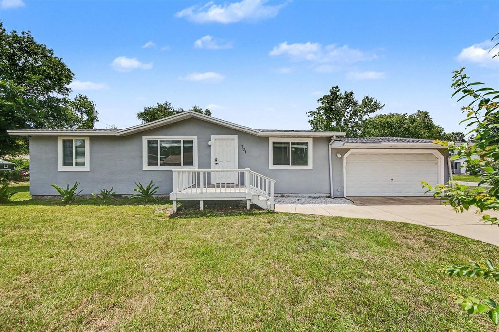 Photo of 701 E Woodland Street, Bunnell, FL 32110 (MLS # V4949225)