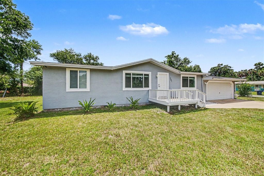 Photo of 701 E Woodland Street, Bunnell, FL 32110 (MLS # V4949225)