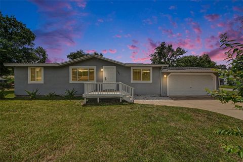 Photo of 701 E Woodland Street, Bunnell, FL 32110 (MLS # V4949225)