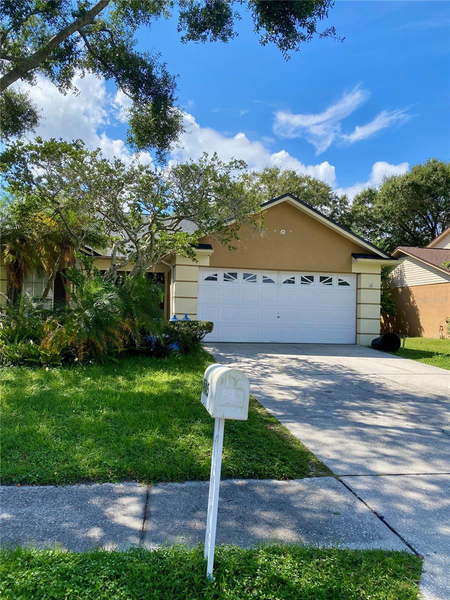 Carrollwood Village Gem! Live the good life in Carrollwood Village! This 1,404 sq ft home boasts a spacious and bright Great Room with vaulted ceilings, giving you the perfect space to unwind. This home offers 3 bedrooms, 2 baths, a double garage, and a fantastic eat-in kitchen. Step outside to your private screened porch for a quiet escape. Enjoy the community's numerous sidewalks for exercise and the unbeatable location. With quick access to the airport, major highways, and the Veterans Expressway, your commute will be a breeze. You'll be minutes from top-rated dining, shopping, and entertainment. Don't miss this opportunity!