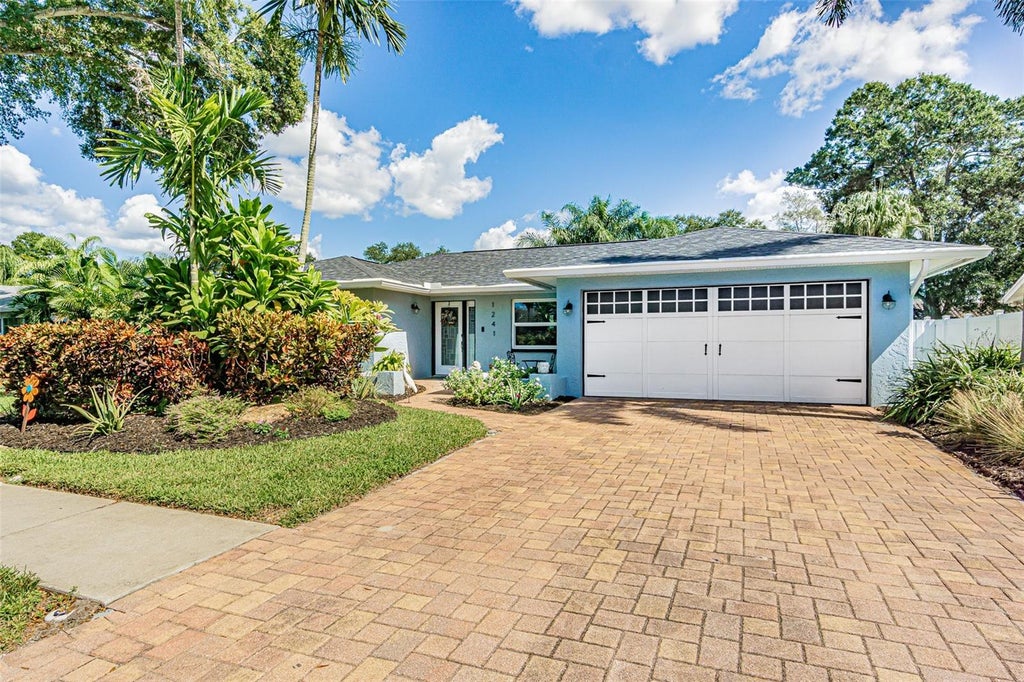 Photo of 1241 Stony Brook Lane, Dunedin, FL 34698 (MLS # TB8556632)