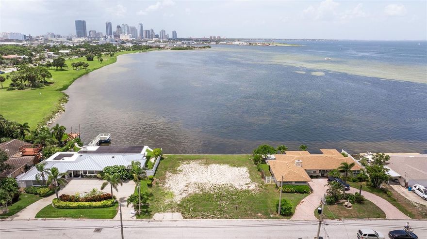 Welcome to your very own slice of paradise in the delightful Tropical Shores! This rare lot is a canvas just waiting for your dream home masterpiece, boasting breathtaking panoramic views of the ever-evolving downtown St. Petersburg skyline. Imagine sipping your morning coffee while soaking in the magical sights of marine life and vibrant birds that come to visit you daily—it’s like having a front-row seat to nature’s own spectacular show! This generous lot measures an impressive 100 feet deep and 90 feet wide, offering you ample space to let your imagination run wild. Want to add a dock? You sure can! Check with the City of St Petersburg for permitting rules. (Just a heads up, no boat lifts allowed). You can however launch water crafts such as kiteboards, paddleboards, kayaks, canoes etc. And let’s not forget Lassing Park, stretching majestically over 14 acres, with fishing spots, kiteboarding, and surfing launch areas right at your fingertips. Picture this: your backyard is an open invitation to all the wonders of the outdoors! So, what are you waiting for? Grab your ideas and sketch out that dream home you’ve always wanted. Schedule your private viewing today and start imagining the incredible lifestyle that awaits you in this beautiful coastal paradise!
The home that was on this lot was torn down in 2017 just after the current owner purchased it. There is no evidence of flooding as the owner has never lived on the property.