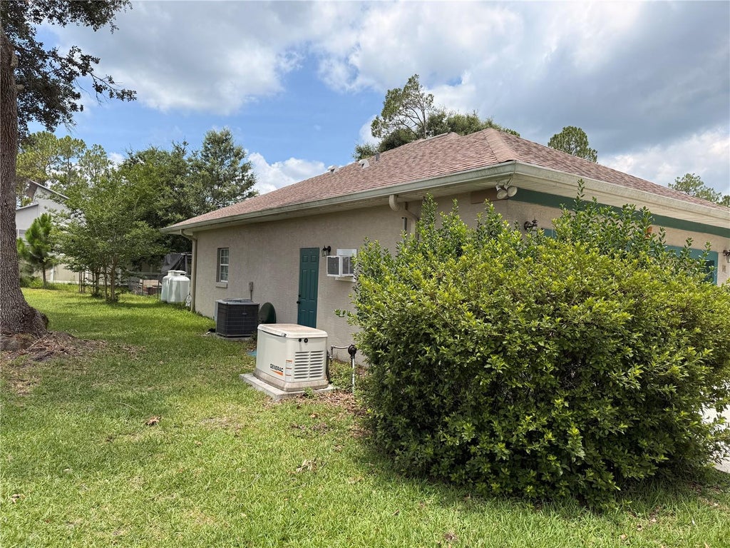 Photo of 41 Walker Drive, Palm Coast, FL 32164 (MLS # FC319494)