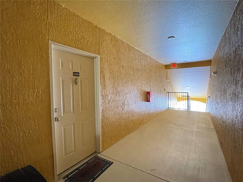 Photo of 8848 Villa View Circle #306, Orlando, FL 32821 (MLS # O6378103)