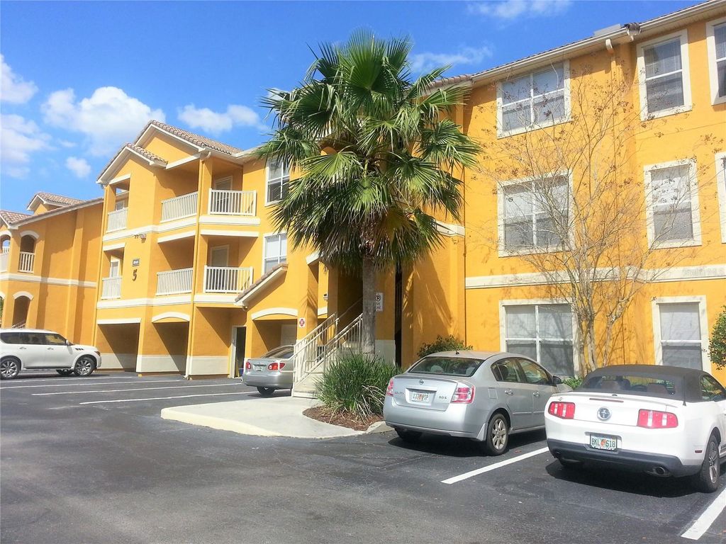 Photo of 8848 Villa View Circle #306, Orlando, FL 32821 (MLS # O6378103)