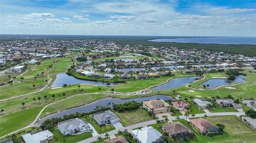 Best value in Punta Gorda Isles!  This golf course and waterfront vacant lot is the ideal place to build your dream home.   Southeast facing, setup perfectly for sunrise to sunset views year round.   Nestled in between holes on St Andrews back nine, it is rarely visited by wayward golf balls.  The large lot allows for larger homes with up to four (4) car garage.   Dream lot where you can drive your golf cart to the course, bike to stores and restaurants, and drive within minutes to some of the most beautiful beaches in Florida, including Boca Grande!