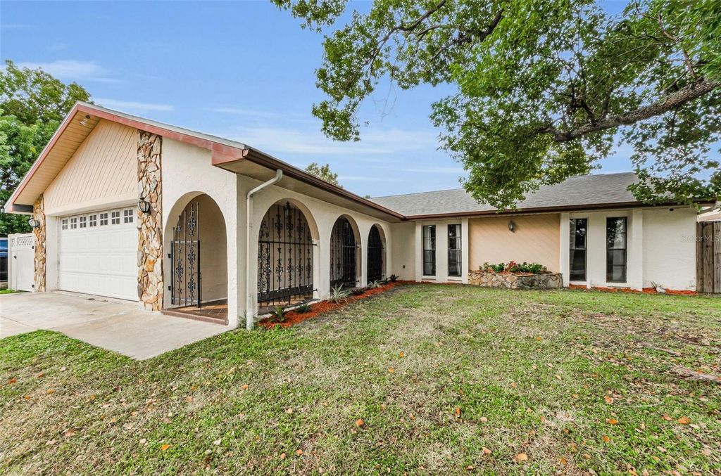 Photo of 8329 Broken Willow Lane, Port Richey, FL 34668 (MLS # TB8435234)