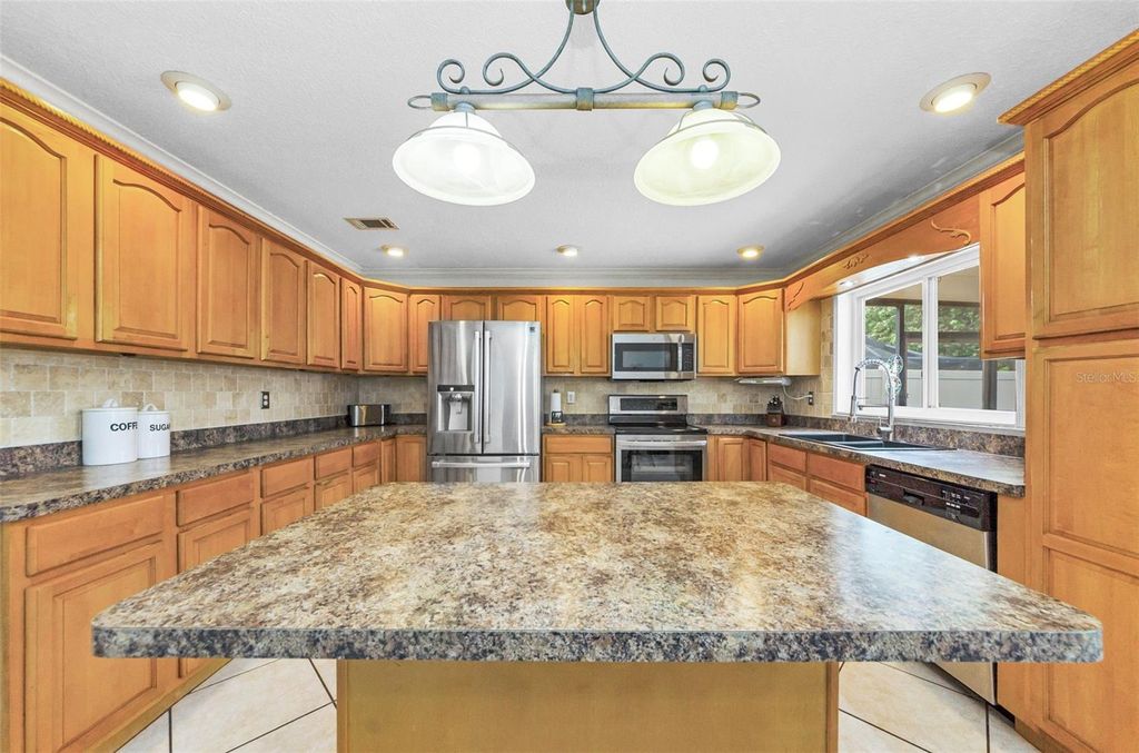 Photo of 8329 Broken Willow Lane, Port Richey, FL 34668 (MLS # TB8435234)