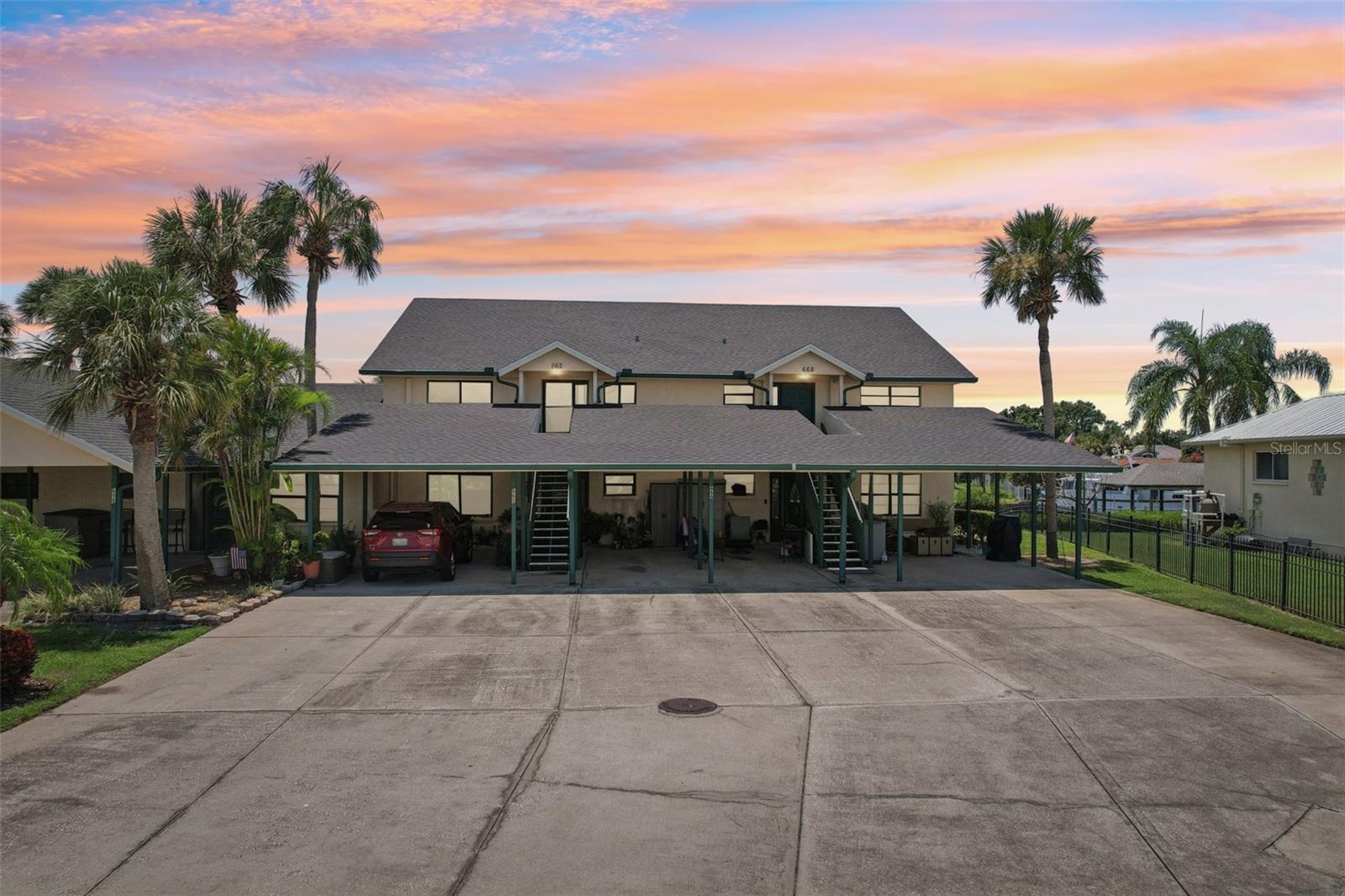 READY NOW! Everything is brand new in this fully remodeled waterfront condo! Welcome to coastal living with wide water views in this 2-bedroom, 2-bathroom home located in a secure, gated community. Perched high and dry on the second floor, this unit offers peace of mind and security. Inside you'll find a coastal modern, open-concept layout with fully updated finishes throughout, including stunning Luxury Vinyl flooring (no carpet), a stylish kitchen with backsplash, gorgeous navy and white cabinets, and under-cabinet lighting. Off to the side is an extra area for dining / entertaining, which is a unique feature built out in the remodel! The Primary bath is opened up, allowing for a spacious shower leading into a massive walk-in closet with custom build-outs, and the laundry unit is conveniently housed within this oversized en-suite. This property feels brand new! IMPACT windows and doors provide added security and lower utility bills. Dual attic spaces provide ample storage with one located downstairs in the assigned covered parking space. Plenty of guest parking is also readily available 24/7. Small pets considered on a case by case scenario, up to 35lbs with community approval. Yardarm is a quick bicycle ride to waterfront dining at the popular Circles and Finns restaurants. Capture the most colorfully landscaped sunsets in Florida at the Apollo Beach Nature Park. State-of-the-art healthcare, new businesses, coffee shops, and all things needed for a convenient, low-traffic lifestyle are within 2 miles. Dolphins, manatees, osprey, and a multitude of feathered friends, idling boaters, and jumping fish will keep you entertained on your screened-in balcony daily. This community did not flood during the storms of 2024. Yardarm has also recently replaced roofs for added safety. Pack your swimsuit! Community pool and tennis courts are included in rent! Tenant is responsible for electric, water, WiFi and contents insurance.