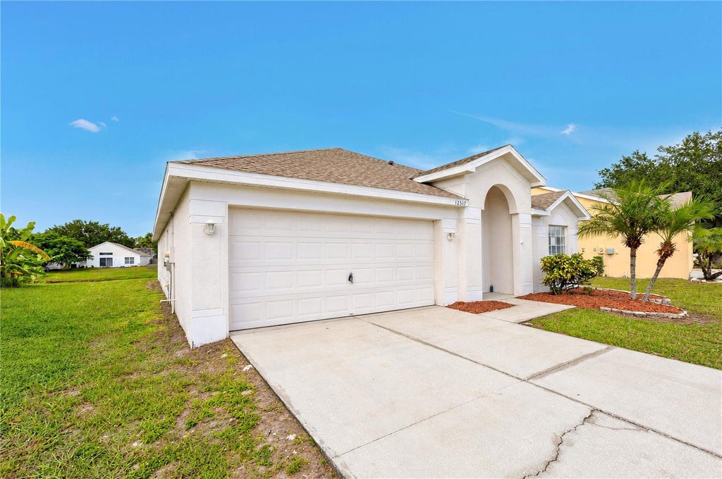 Photo of 12517 Midpointe Drive, Riverview, FL 33578 (MLS # O6450338)